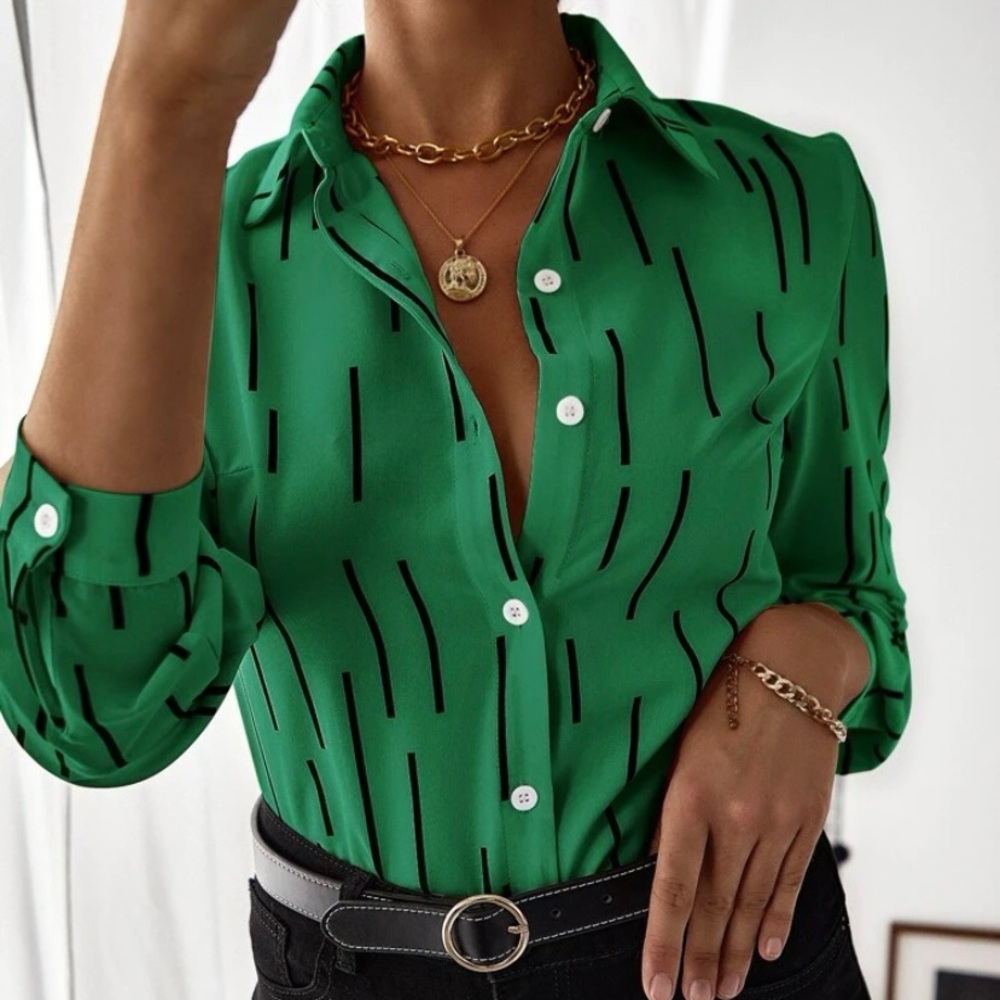 Fun geometric green and black blouse